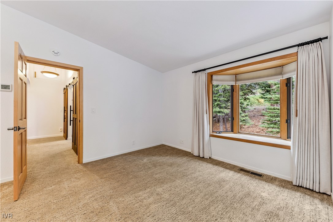 771 Randall Avenue Incline Village, NV 89451 - Photo 16 of 44 Primary suite with forest views, private entry, an