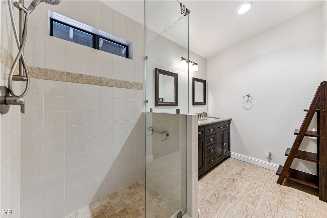 771 Randall Avenue Incline Village, NV 89451 - Photo 19 of 44 a bathroom with a sink vanity and mirror