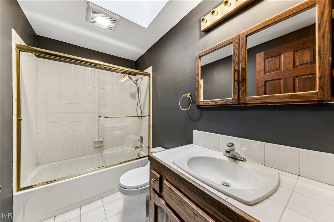 771 Randall Avenue Incline Village, NV 89451 - Photo 27 of 44 a bathroom with a sink toilet mirror and shower