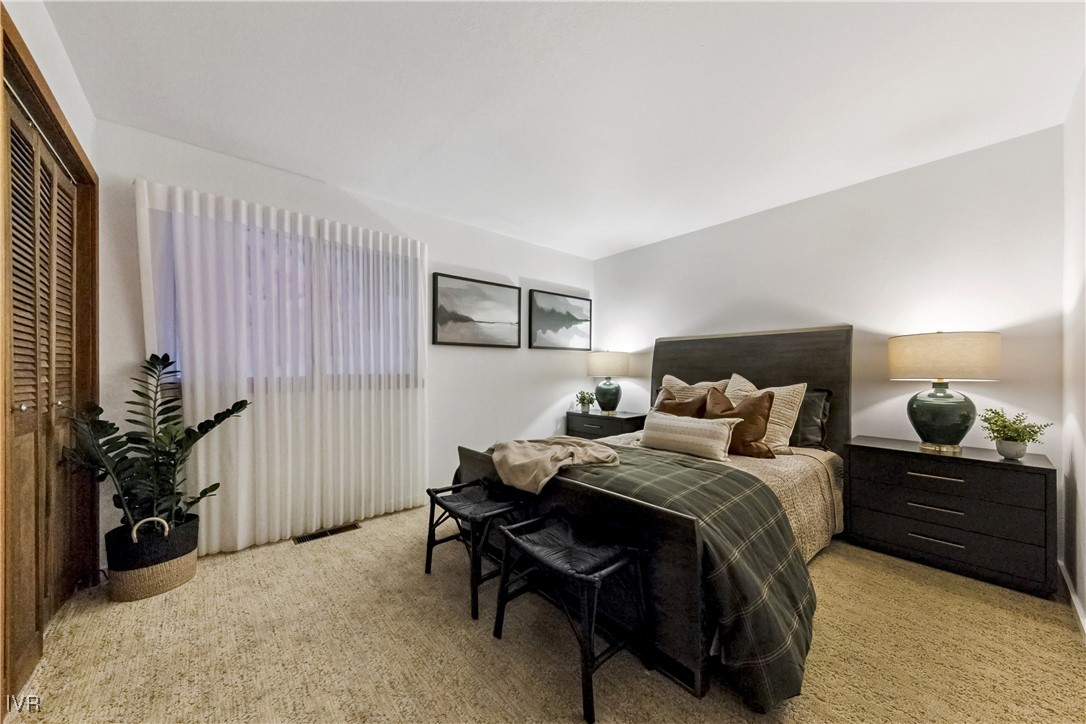 771 Randall Avenue Incline Village, NV 89451 - Photo 31 of 44 a bedroom with a bed and a tv