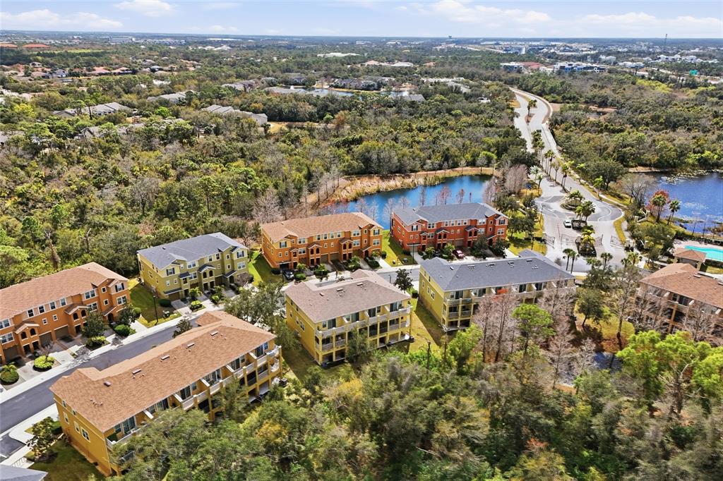 8907 White Sage Loop Lakewood Ranch, FL 34202 - Photo 30 of 33 an aerial view of multiple house