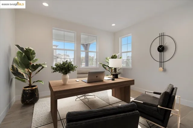 a living room with furniture and lamp