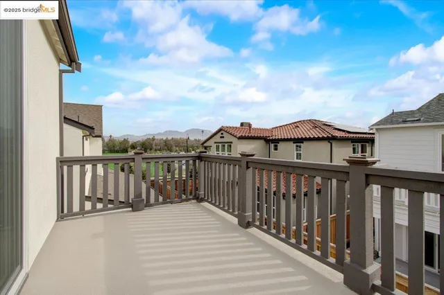 an aerial view of a residential apartment building with a yard