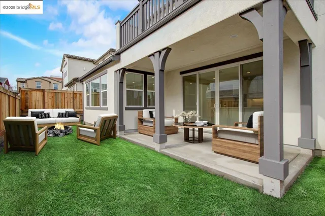 an aerial view of a house with a garden