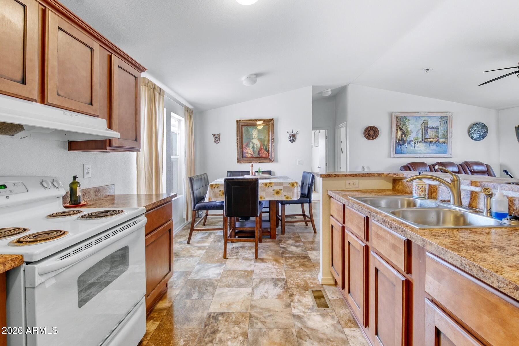 1250 North Fort Grant Road Willcox, AZ 85643 - Photo 11 of 33 a kitchen that has a table and chairs in it