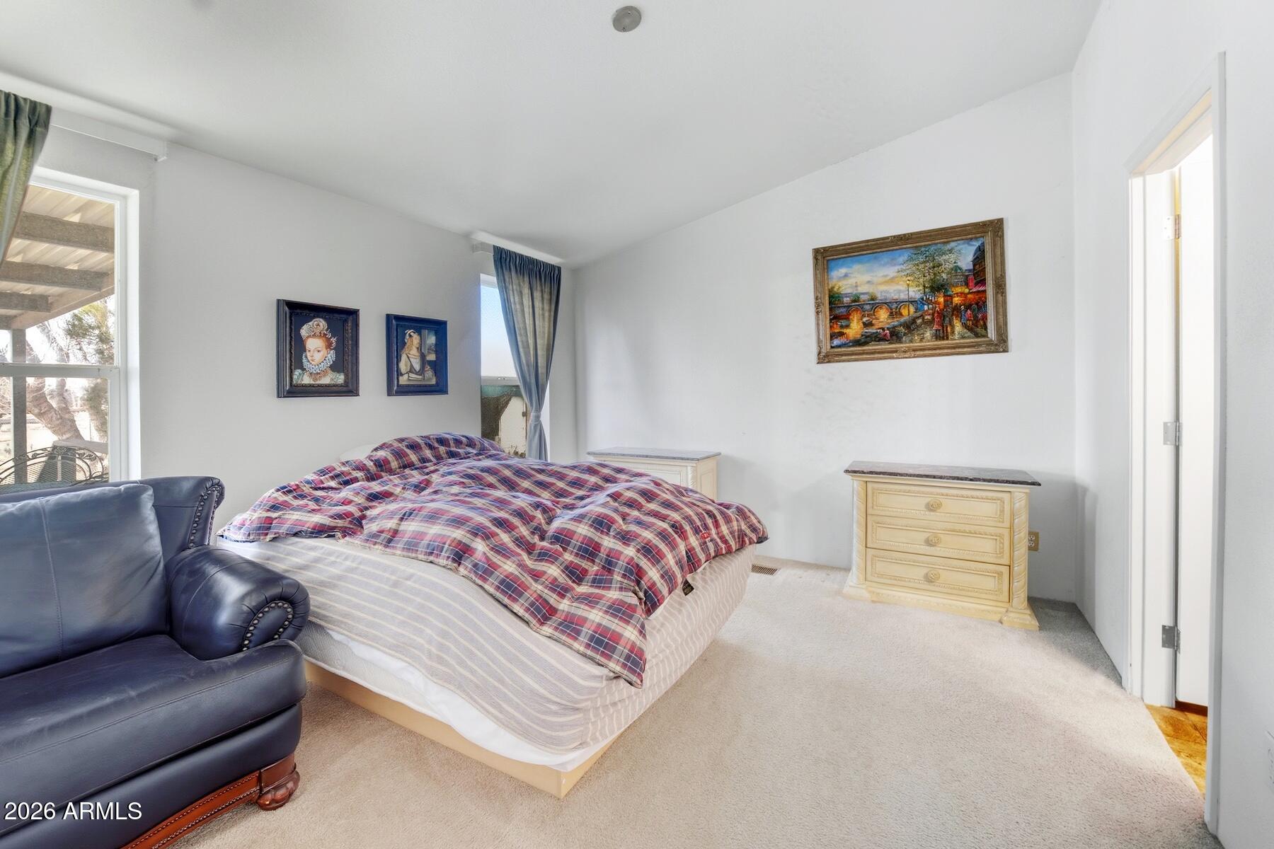 1250 North Fort Grant Road Willcox, AZ 85643 - Photo 15 of 33 a bedroom with a bed and a couch