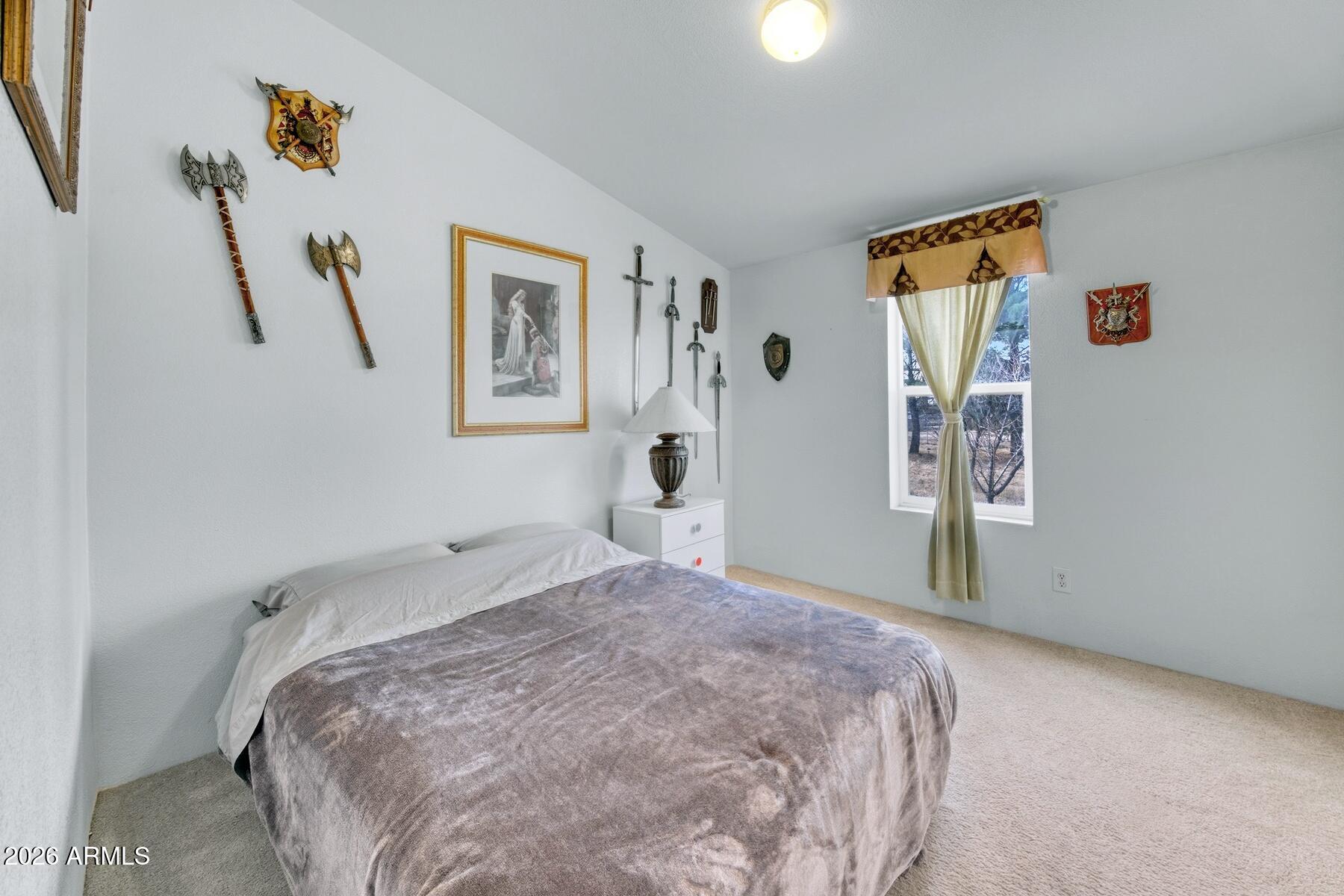 1250 North Fort Grant Road Willcox, AZ 85643 - Photo 19 of 33 a bedroom with a bed and a window