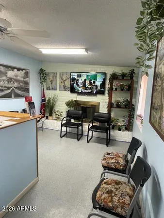 a living room with furniture and window