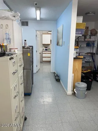 a kitchen with stainless steel appliances a sink and cabinets