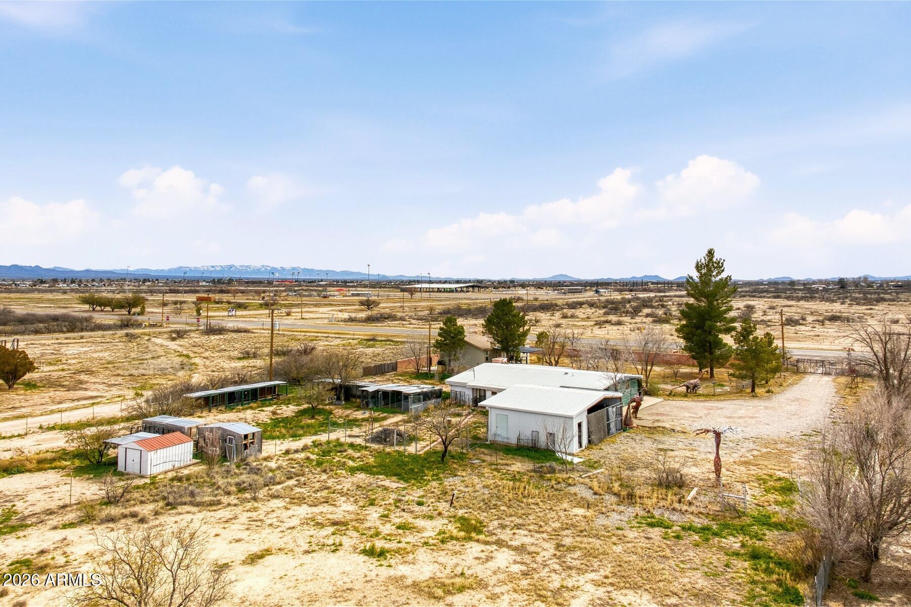 1250 North Fort Grant Road Willcox, AZ 85643 - Photo 31 of 33 a view of an ocean with boats and trees in the background