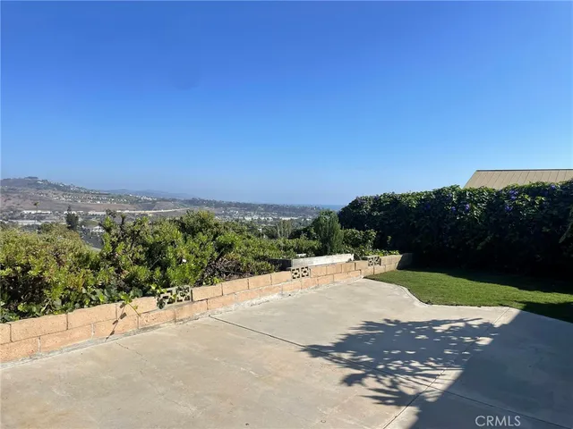 a view of a road with a yard