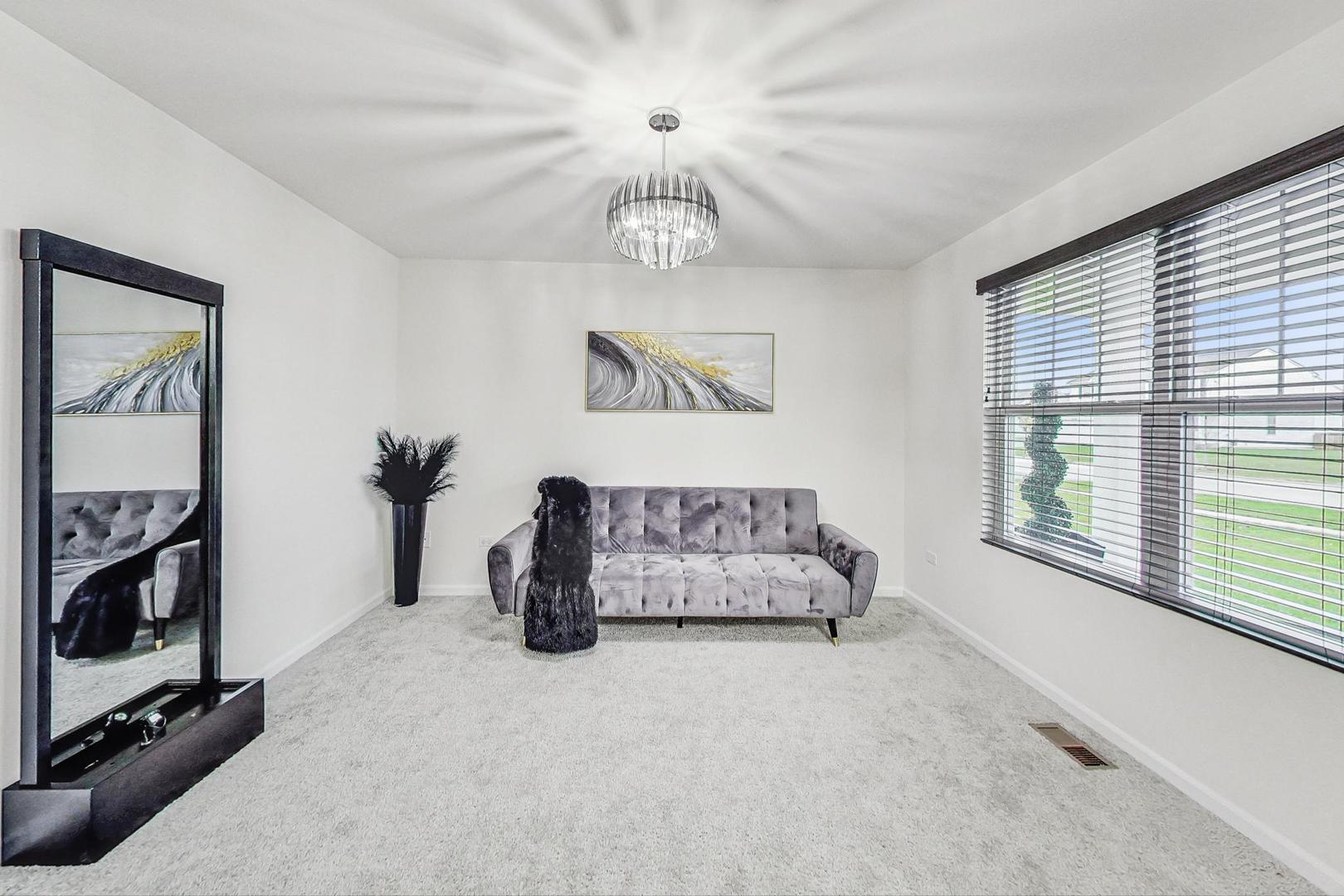 1014 Sharp Drive Plano, IL 60545 - Photo 17 of 52 a living room with furniture