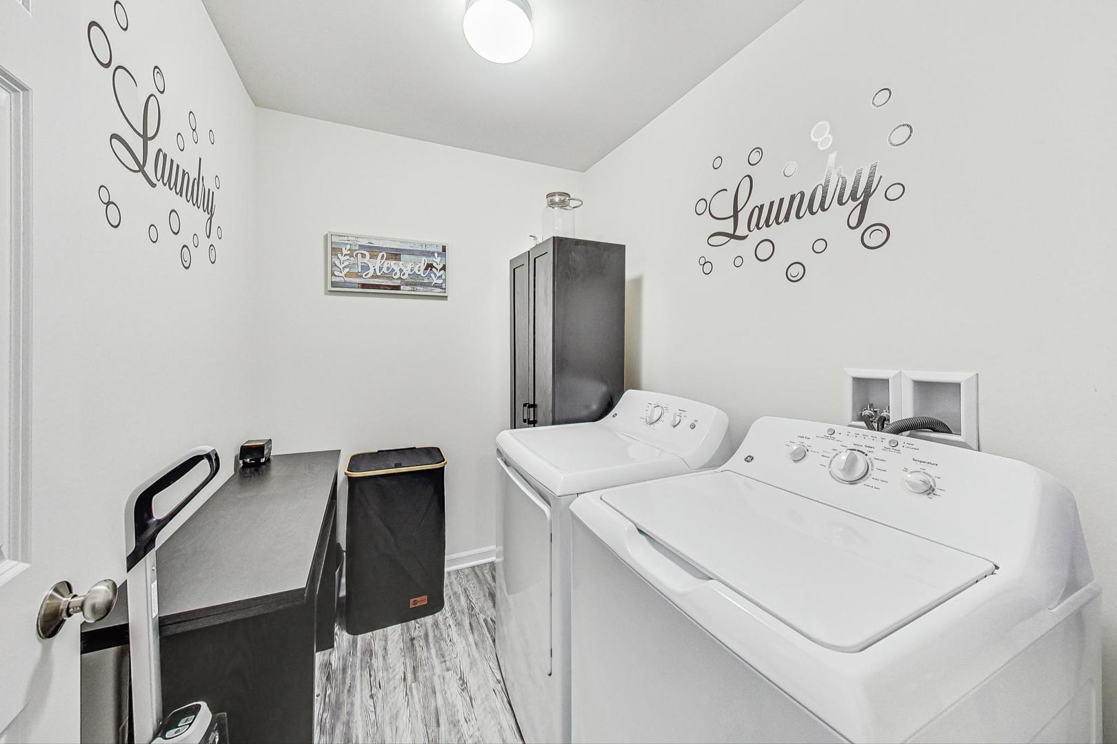 1014 Sharp Drive Plano, IL 60545 - Photo 21 of 52 a utility room with dryer and washer