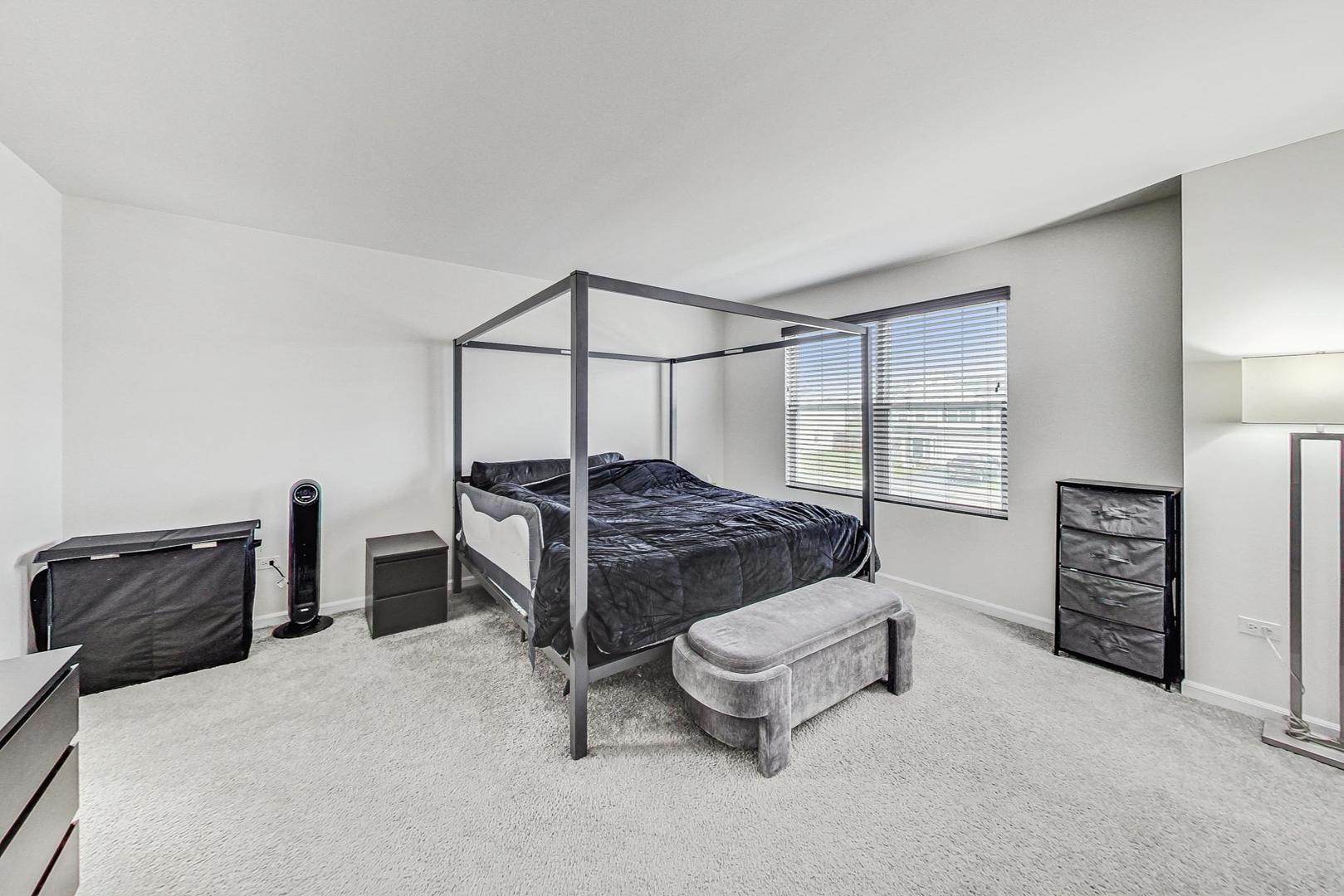 1014 Sharp Drive Plano, IL 60545 - Photo 22 of 52 a bedroom with a bed and a closet