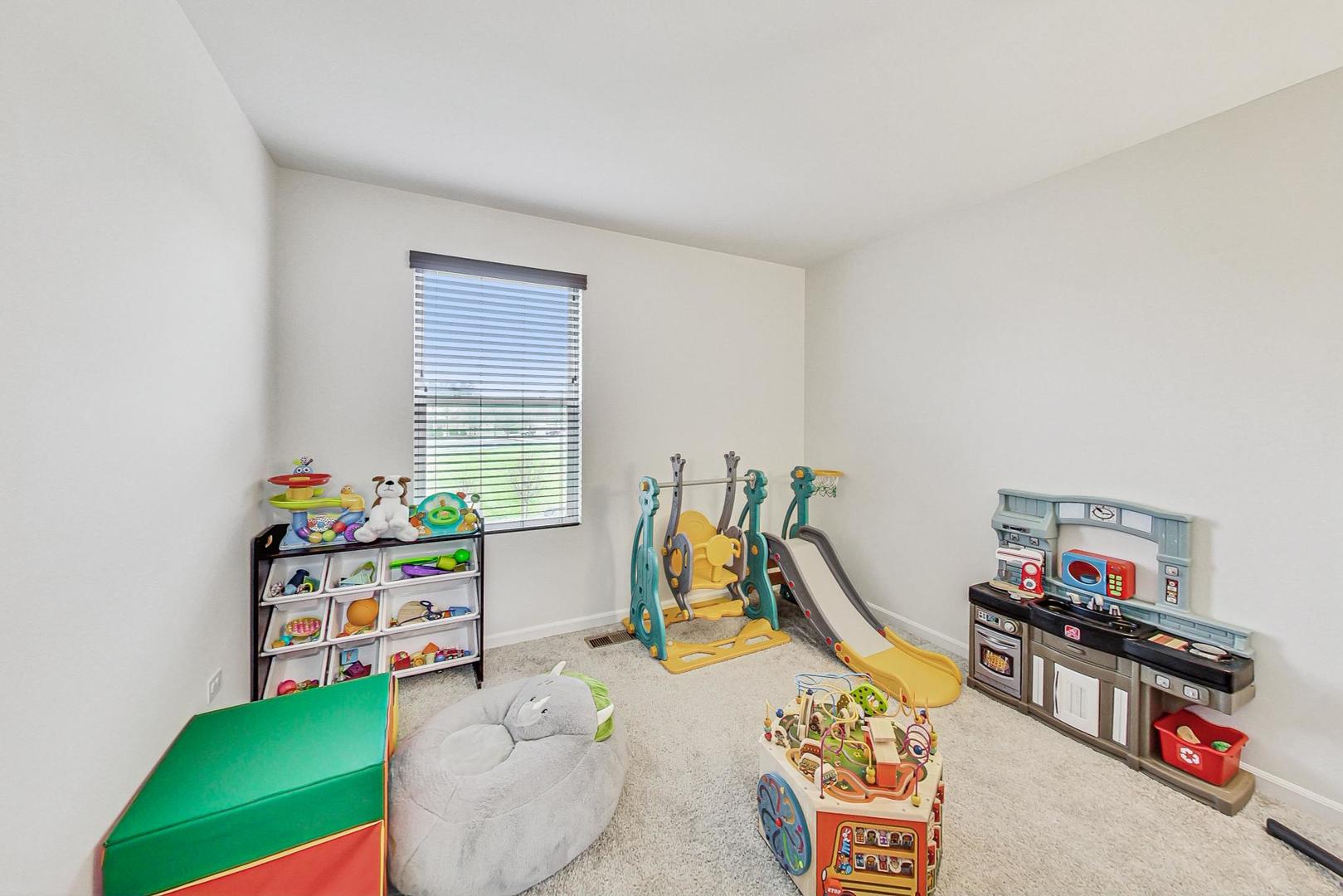 1014 Sharp Drive Plano, IL 60545 - Photo 35 of 52 a living room with furniture and a wooden floor