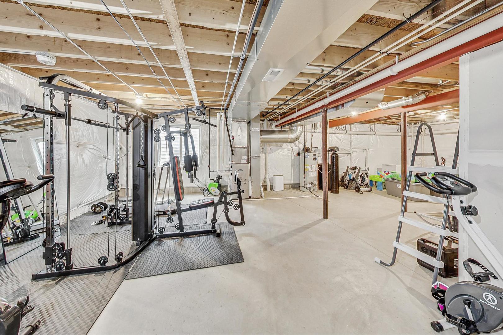 1014 Sharp Drive Plano, IL 60545 - Photo 39 of 52 a view of a room with gym equipment