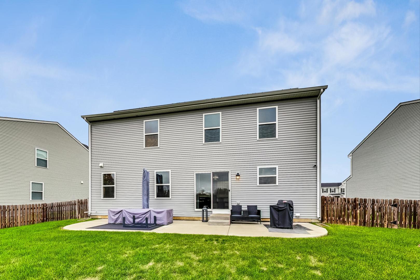 1014 Sharp Drive Plano, IL 60545 - Photo 42 of 52 a front view of house with yard