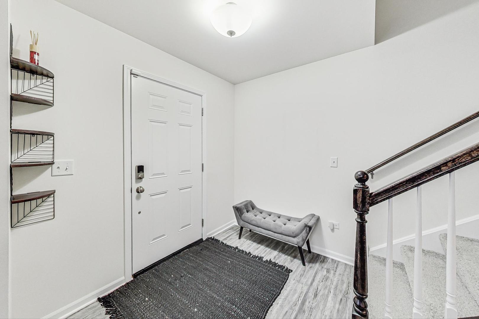 1014 Sharp Drive Plano, IL 60545 - Photo 6 of 52 a view of room with furniture and wooden floor