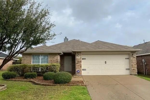 9808 Pierce Drive McKinney, TX 75072 - Photo 1 of 1 a front view of a house with a garden