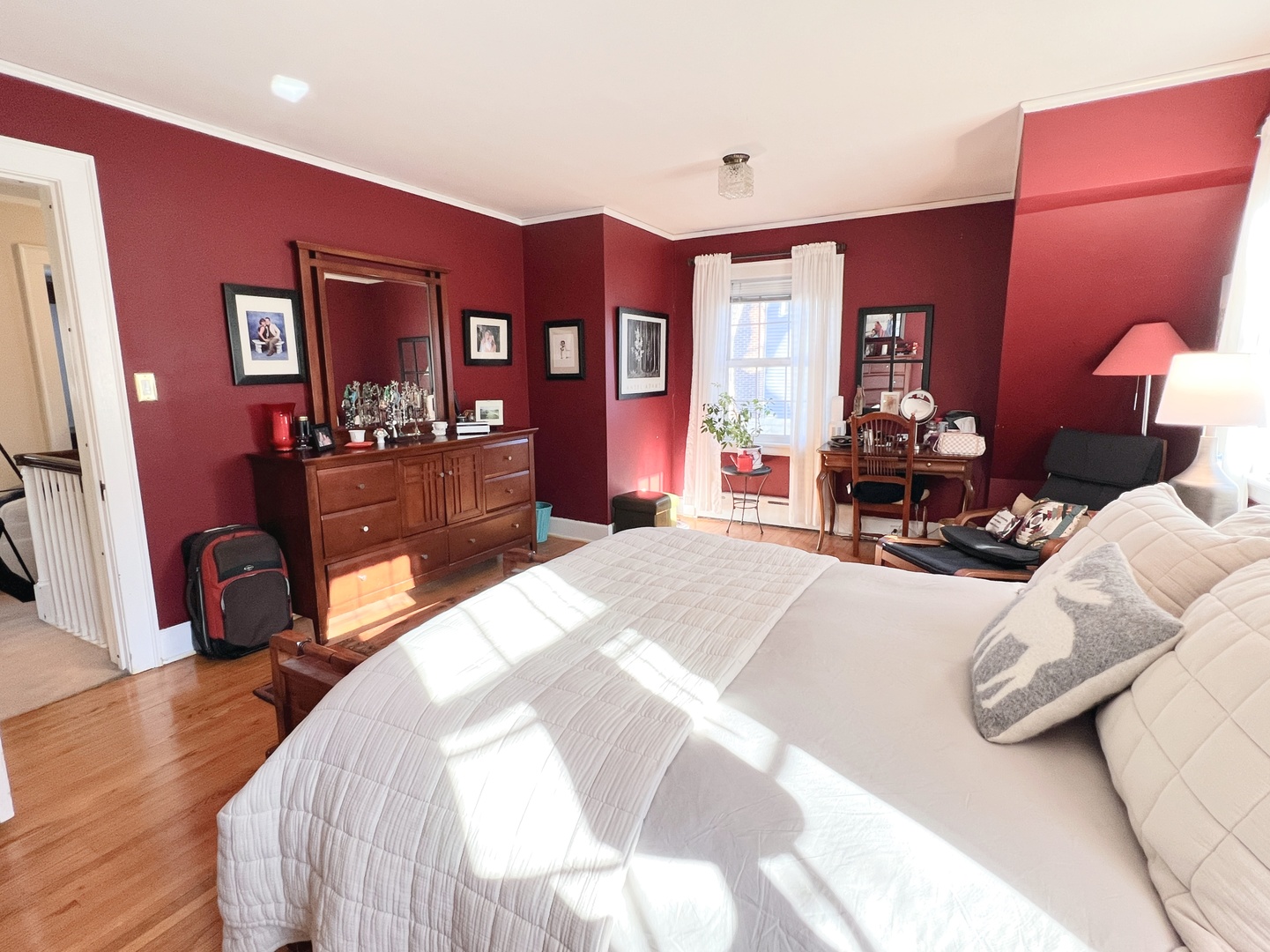 2037 Clinton Street Rockford, IL 61103 - Photo 15 of 27 a bed room with a bed mirror and a chair