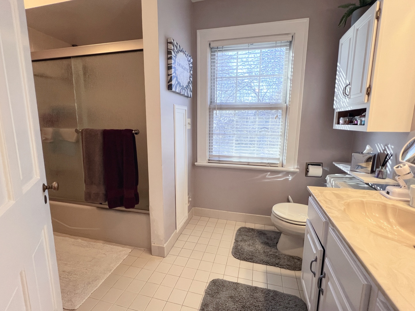 2037 Clinton Street Rockford, IL 61103 - Photo 18 of 27 a bathroom with a sink toilet and shower