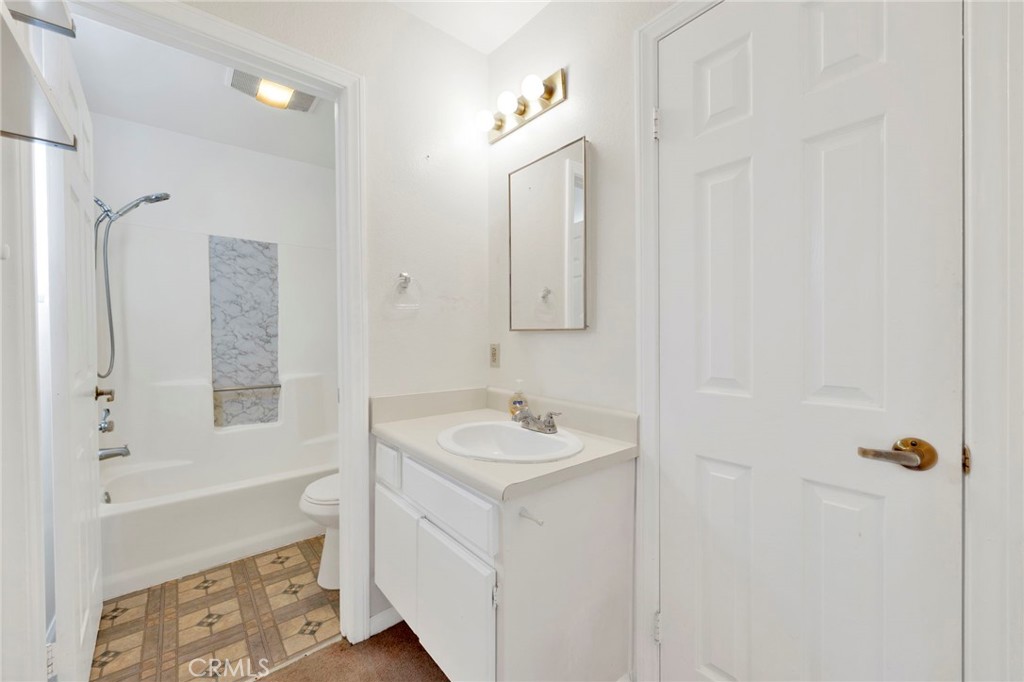 1835 South Alta Vista Avenue, Unit D Monrovia, CA 91016 - Photo 14 of 20 a bathroom with a sink a toilet and shower