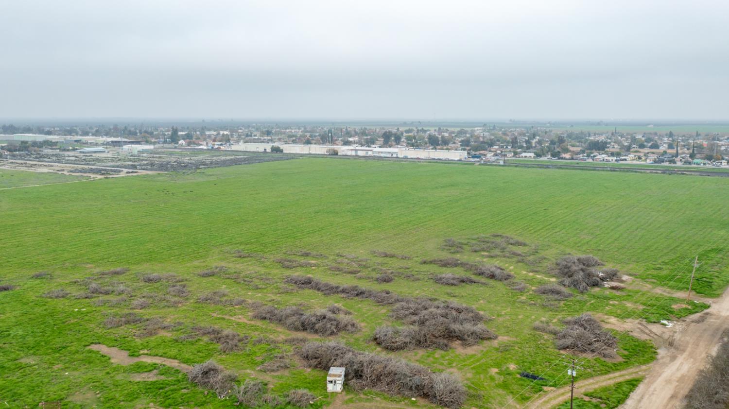 0 Ave 48 Earlimart, CA 93219 - Photo 4 of 21 an aerial view of a houses with a yard