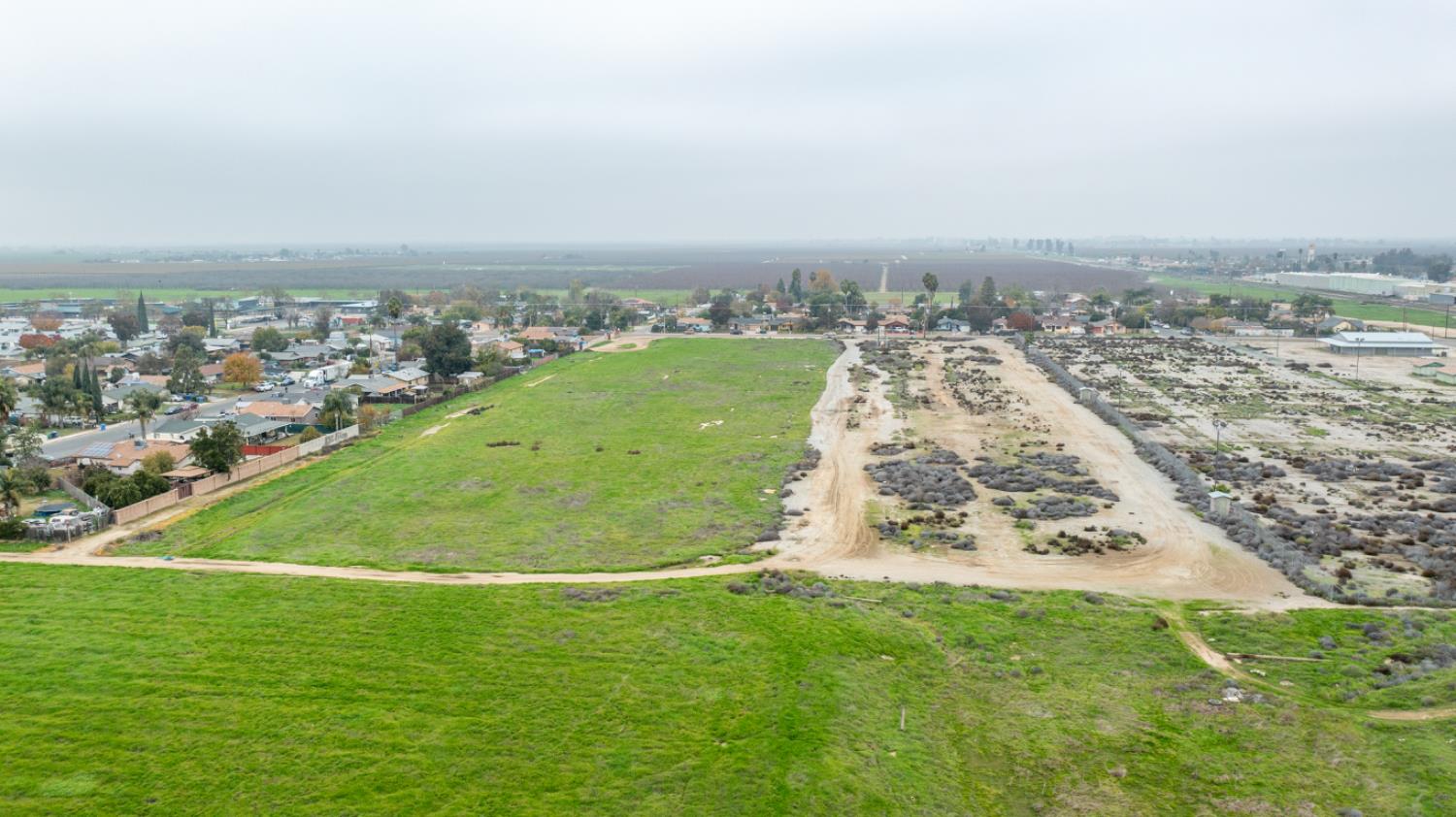 0 Ave 48 Earlimart, CA 93219 - Photo 7 of 21 an aerial view of residential houses with outdoor space