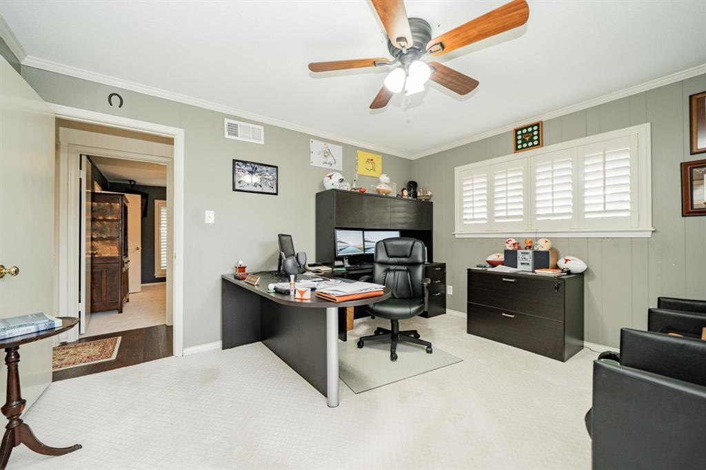 9511 Fallbrook Drive Dallas, TX 75243 - Photo 36 of 40 a living room with furniture and a flat screen tv