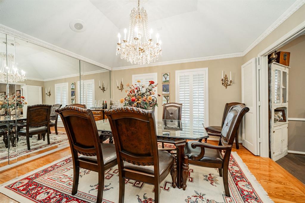 9511 Fallbrook Drive Dallas, TX 75243 - Photo 5 of 40 a view of a dining room with furniture and a chandelier