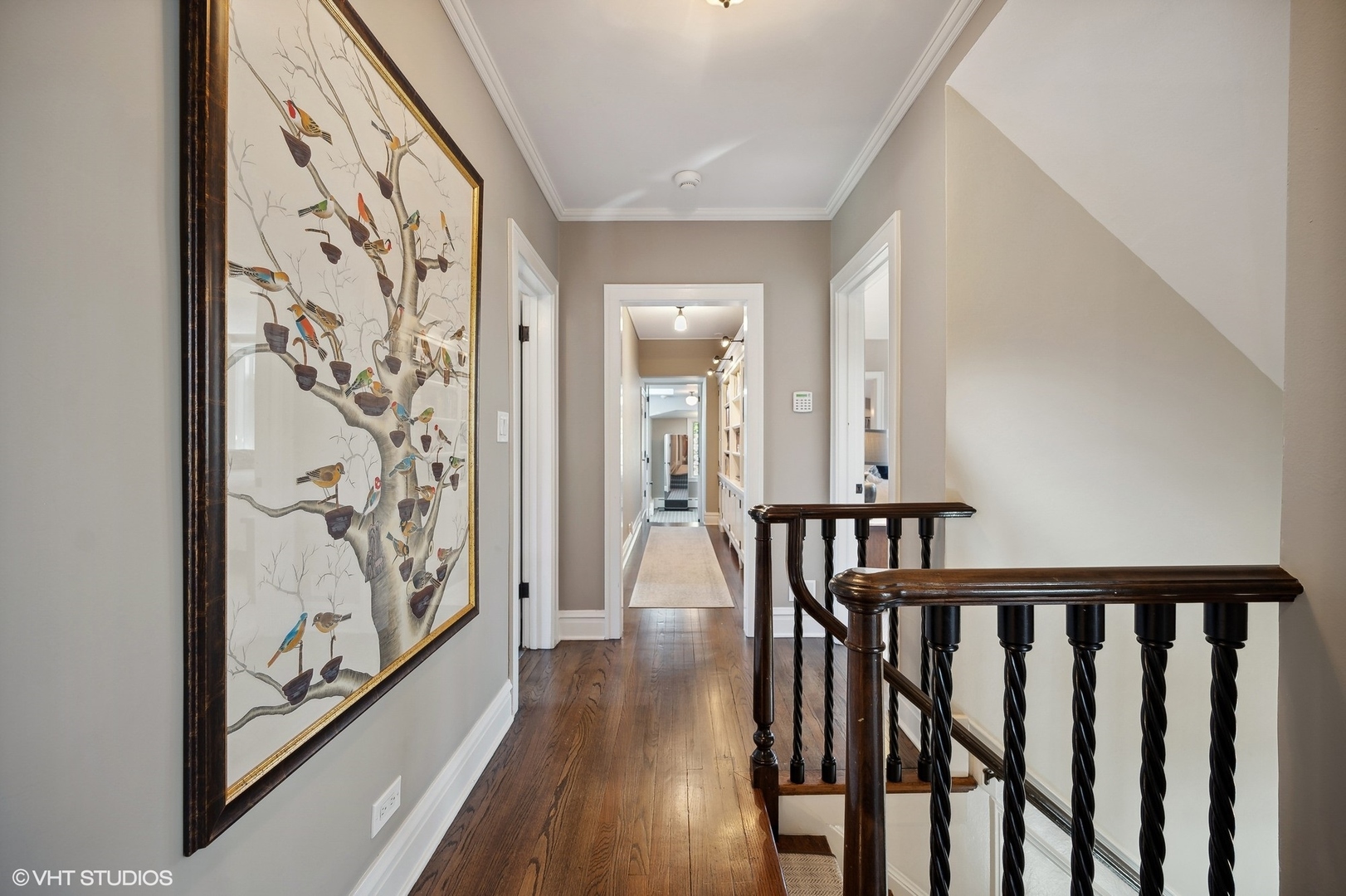 348 Sterling Road Kenilworth, IL 60043 - Photo 44 of 67 a view of a hallway with wooden floor and staircase