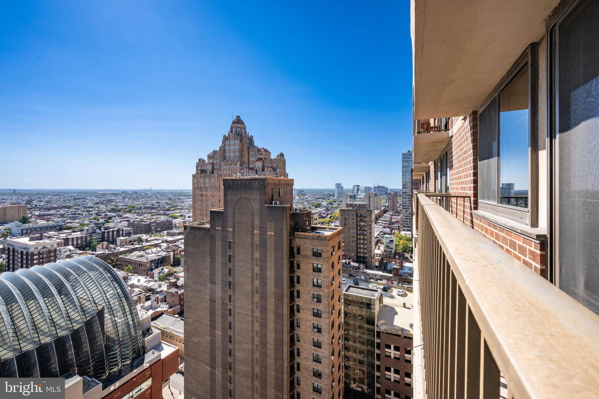 1420 Locust Street, Unit 24R Philadelphia, PA 19102 - Photo 9 of 31 a view of a city from a balcony