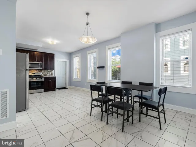 a view of a dining room with furniture