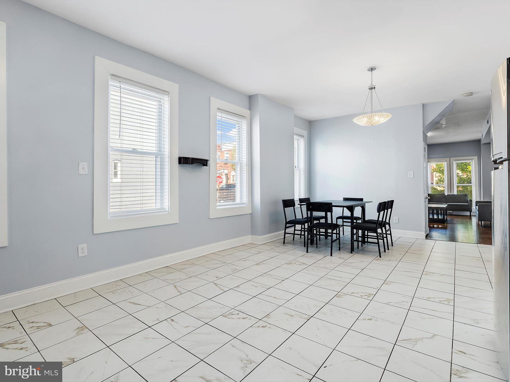 1713 East Lafayette Avenue Baltimore, MD 21213 - Photo 13 of 29 a view of a dining area with furniture