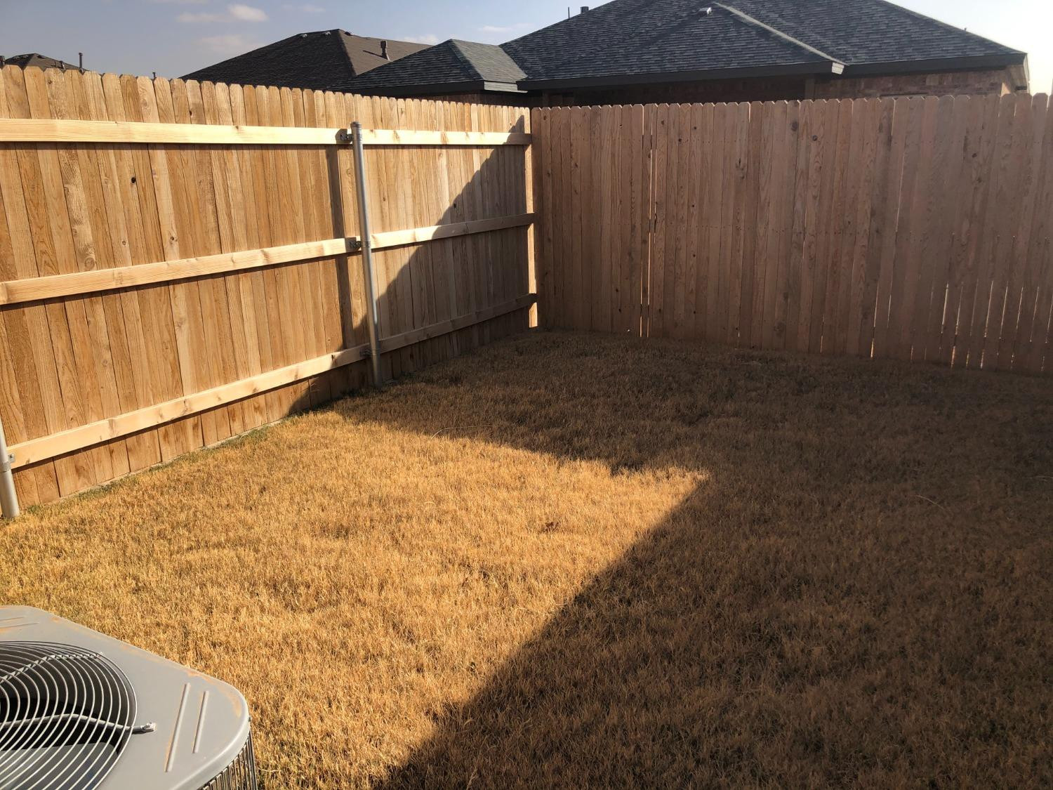 2723 137th Street Lubbock, TX 79423 - Photo 19 of 19 a view of outdoor space with wooden fence