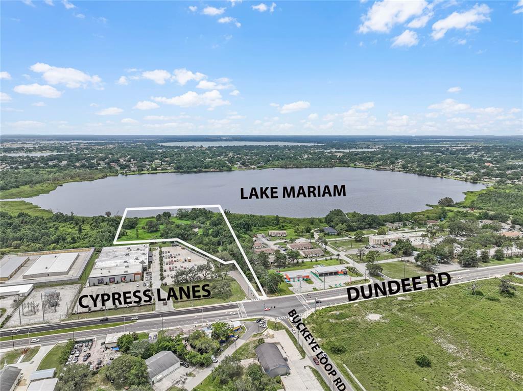 2000 Dundee Road Winter Haven, FL 33884 - Photo 2 of 35 an aerial view of a city