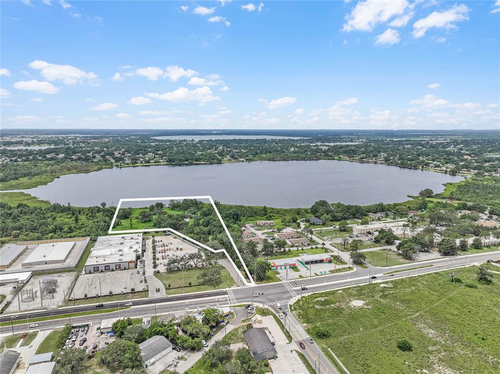 2000 Dundee Road Winter Haven, FL 33884 - Photo 4 of 35 an aerial view of a city