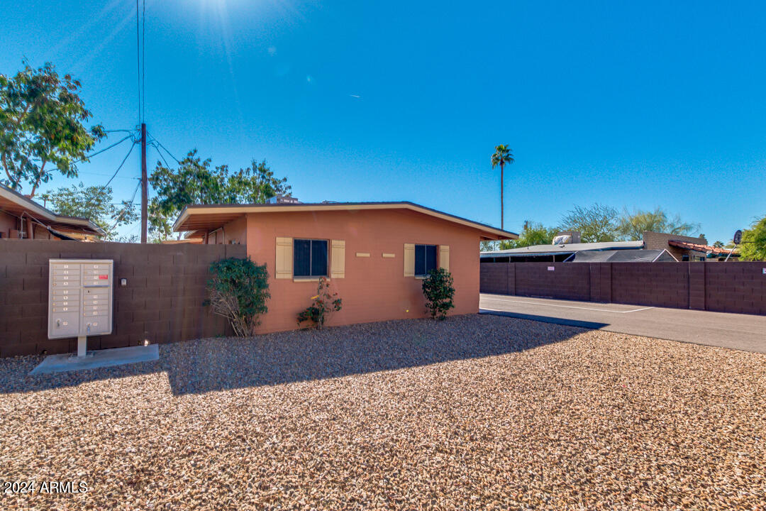 1921 East Virginia Avenue, Unit 14 Phoenix, AZ 85006 - Photo 20 of 20 a front view of a house with a yard