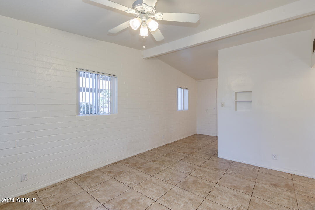 1921 East Virginia Avenue, Unit 14 Phoenix, AZ 85006 - Photo 2 of 20 a view of an empty room with a window