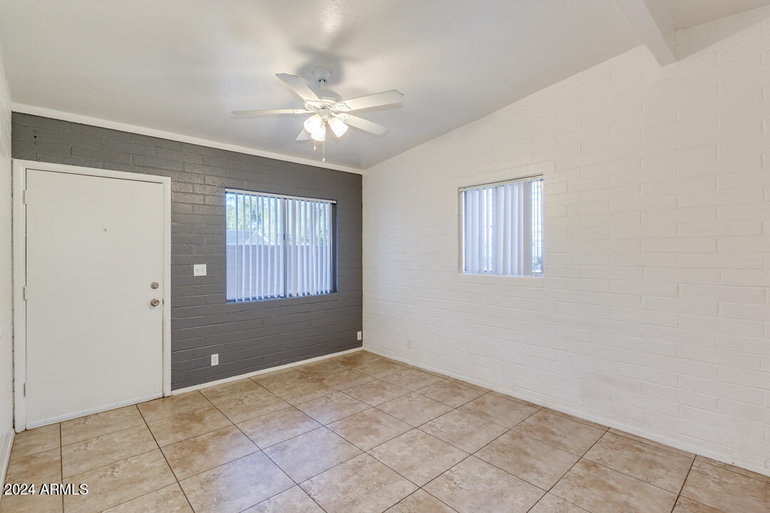 1921 East Virginia Avenue, Unit 14 Phoenix, AZ 85006 - Photo 4 of 20 a view of an empty room with a window