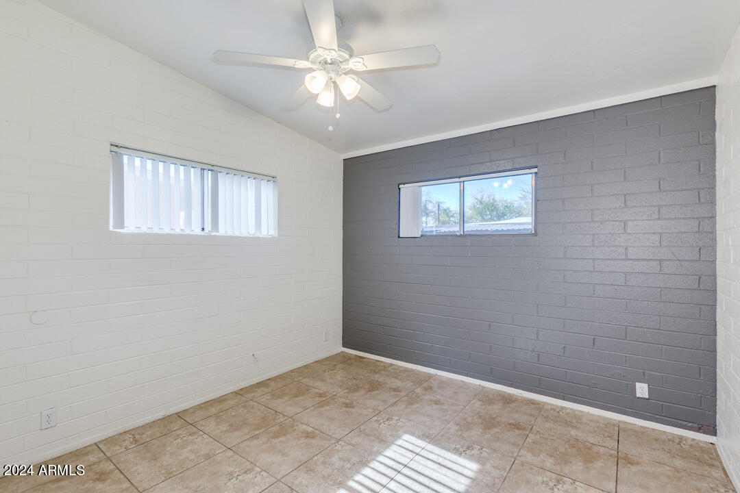 1921 East Virginia Avenue, Unit 14 Phoenix, AZ 85006 - Photo 10 of 20 a view of livingroom with window