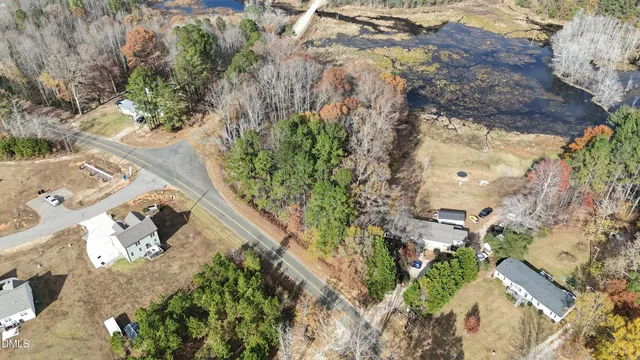 an aerial view of residential house with outdoor space