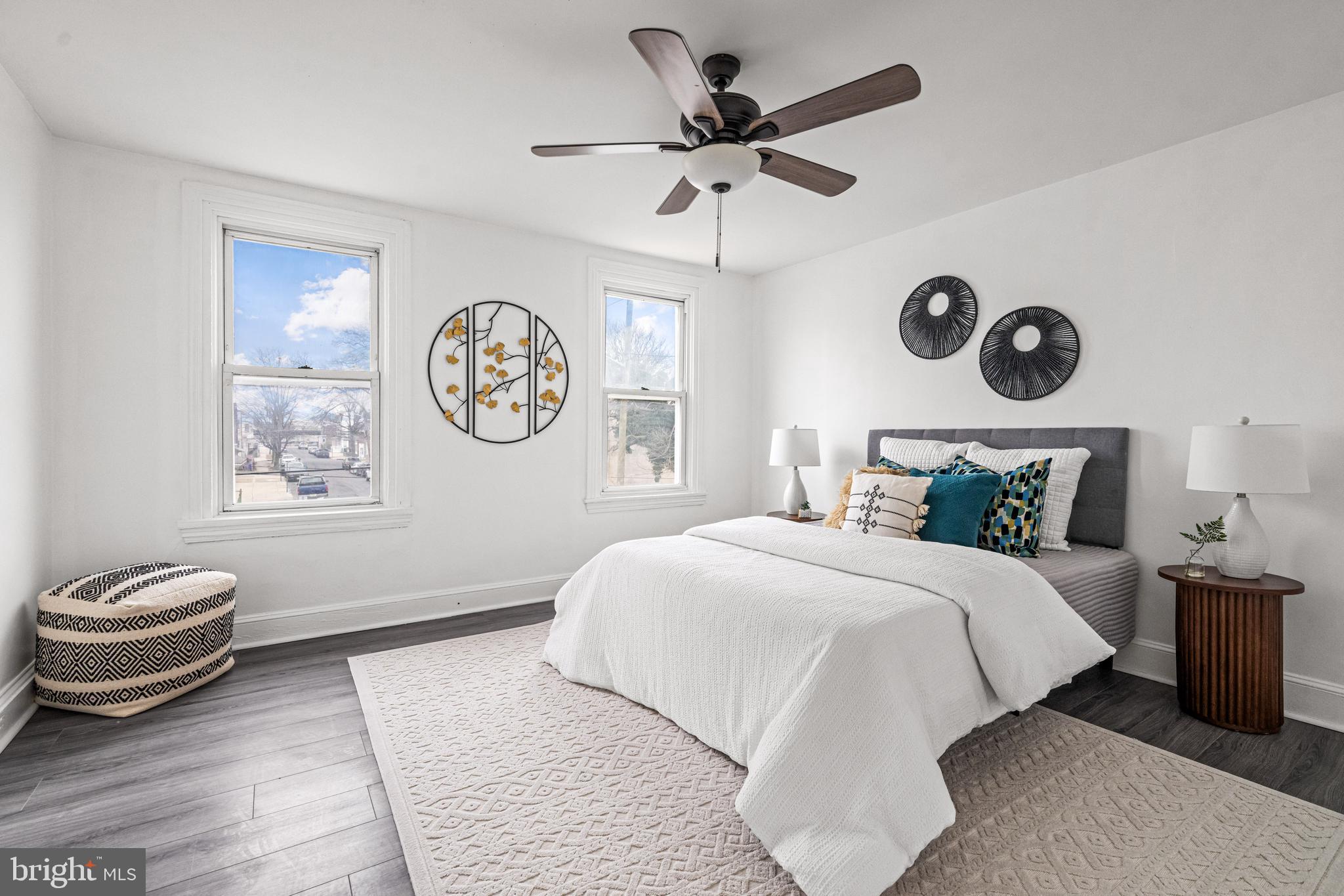 239 3rd Street Gloucester City, NJ 08030 - Photo 13 of 20 a bedroom with a bed and a window