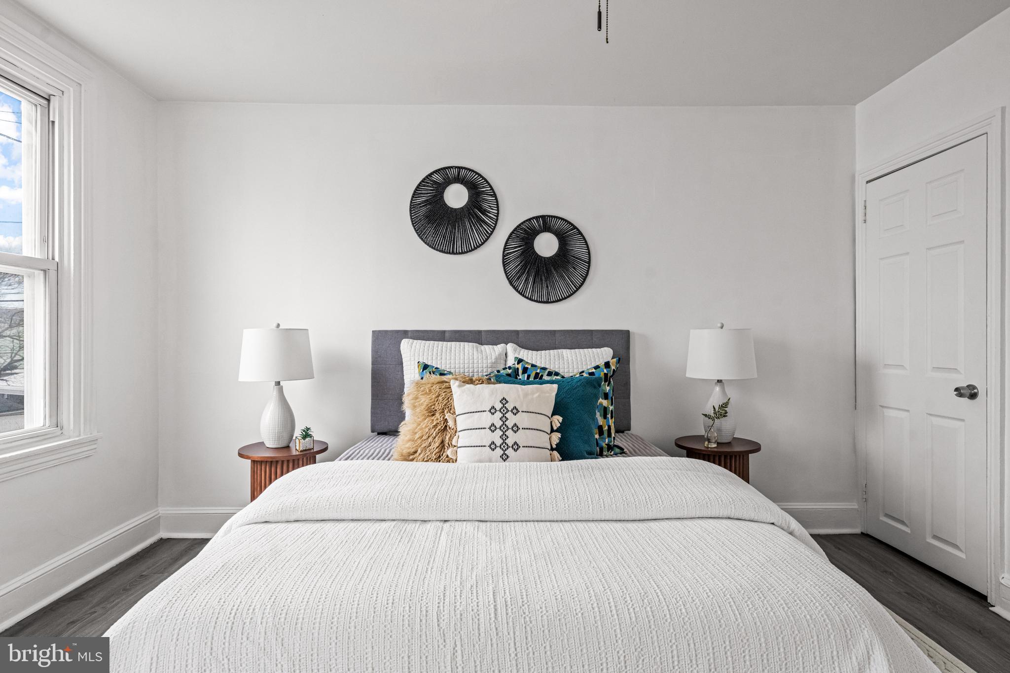 239 3rd Street Gloucester City, NJ 08030 - Photo 14 of 20 a bedroom with a bed and a window