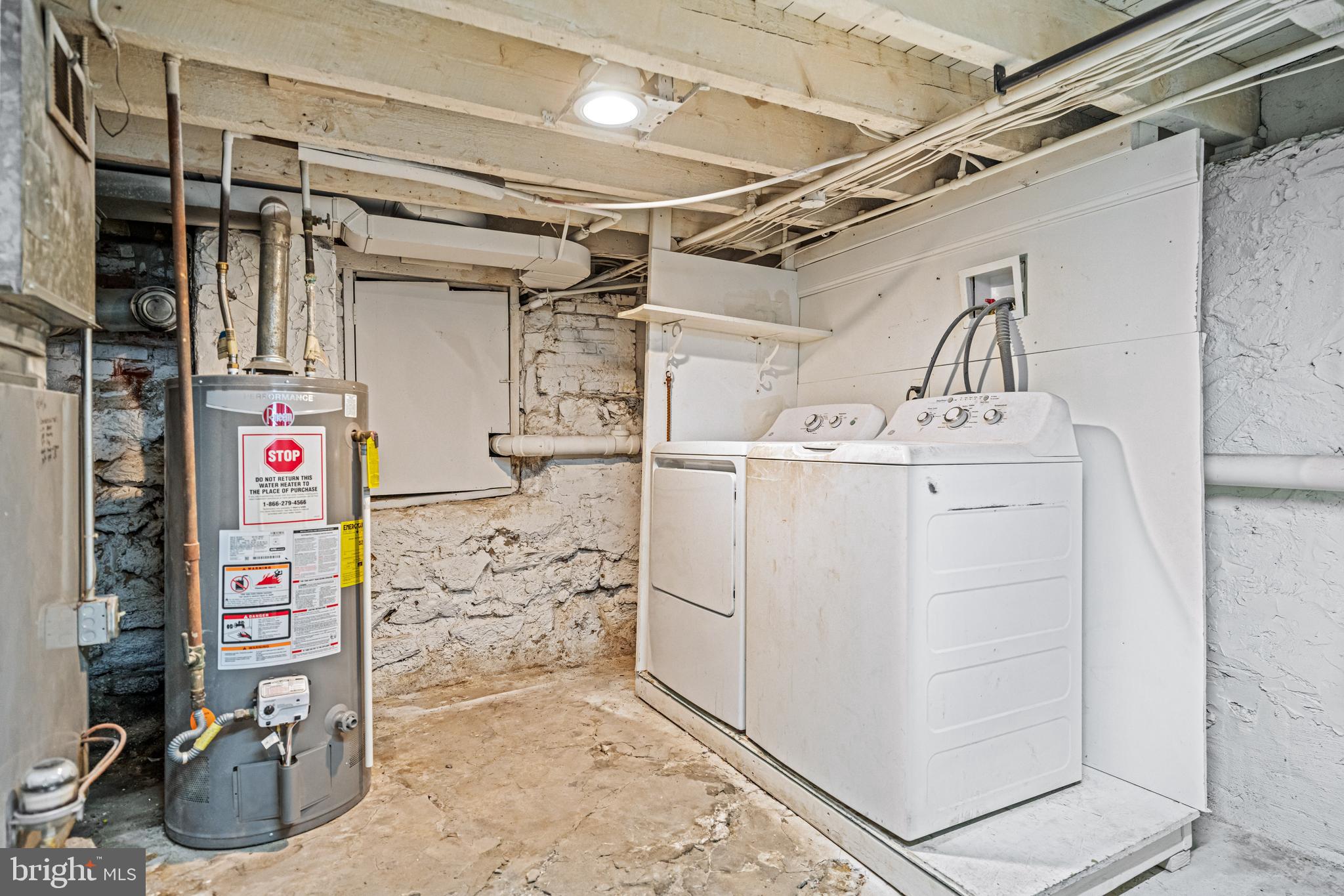 239 3rd Street Gloucester City, NJ 08030 - Photo 18 of 20 a utility room with cabinets