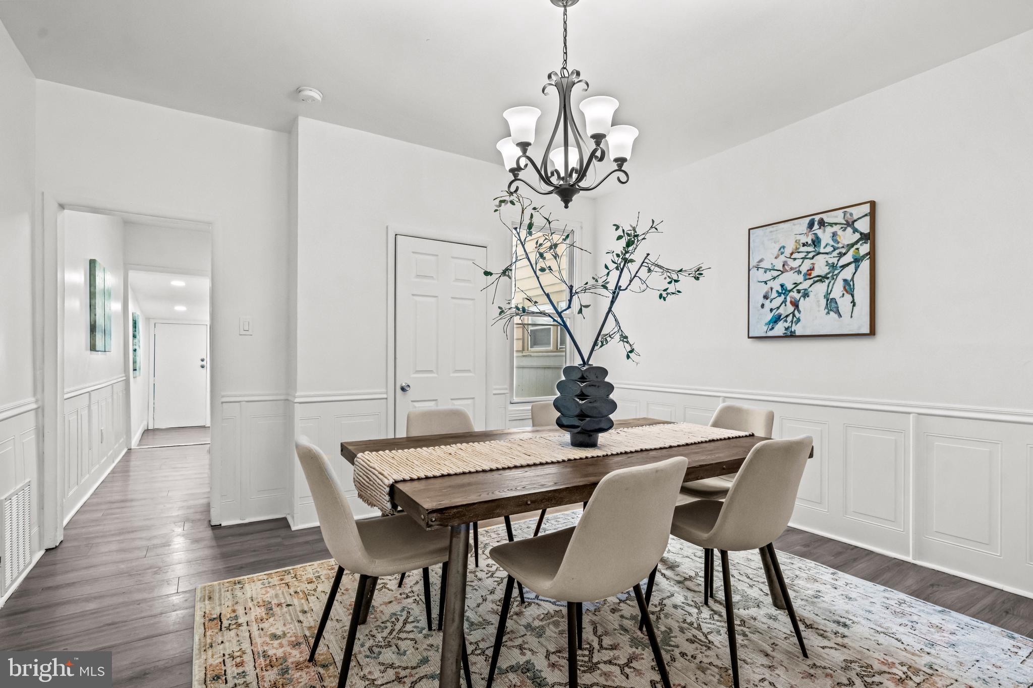 239 3rd Street Gloucester City, NJ 08030 - Photo 5 of 20 a view of a dining room with furniture and wooden floor