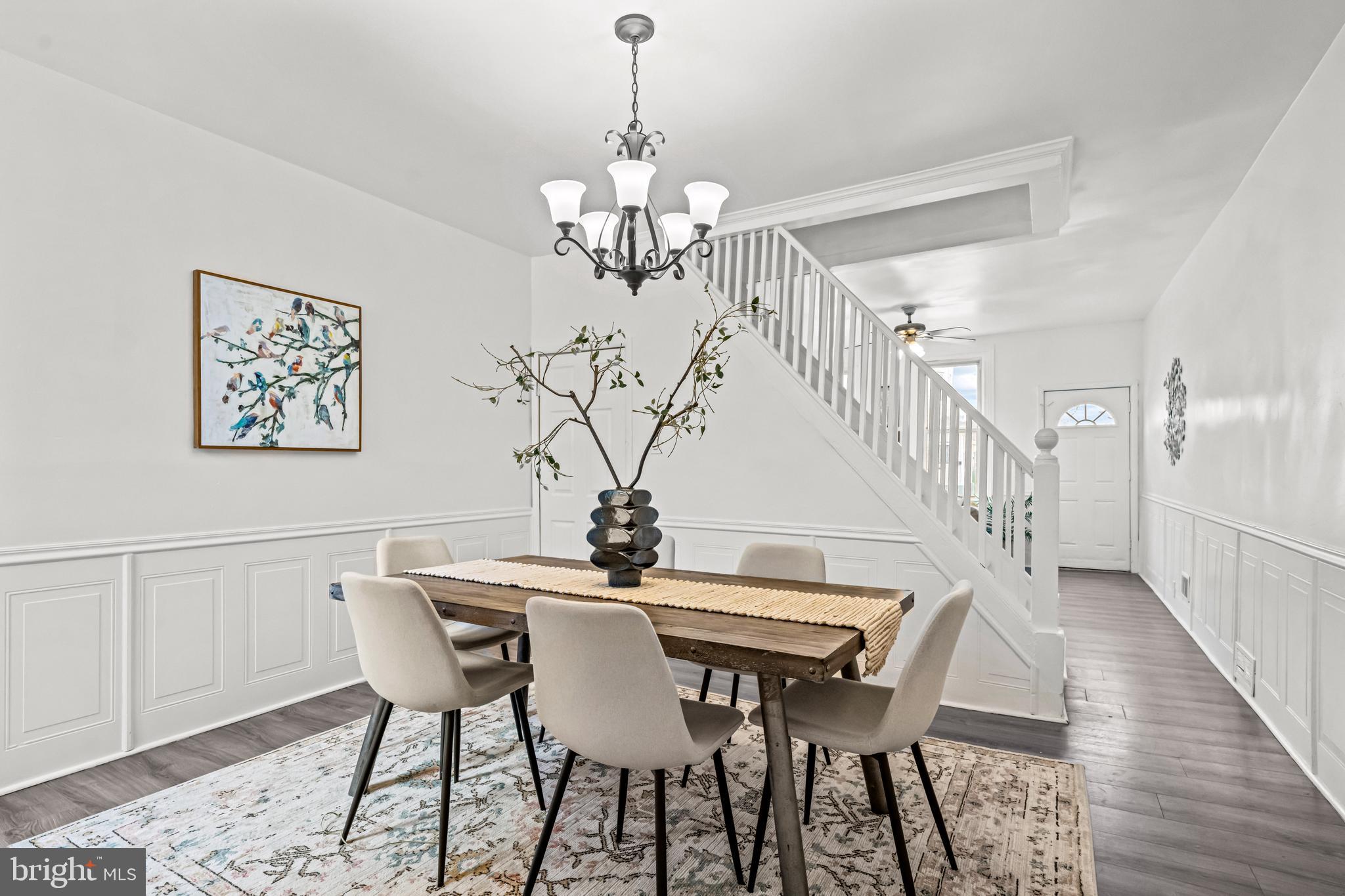 239 3rd Street Gloucester City, NJ 08030 - Photo 6 of 20 a view of a dining room with furniture and wooden floor