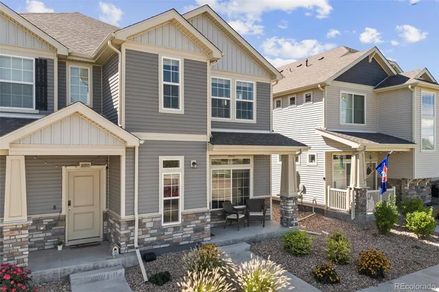 a front view of a house with patio