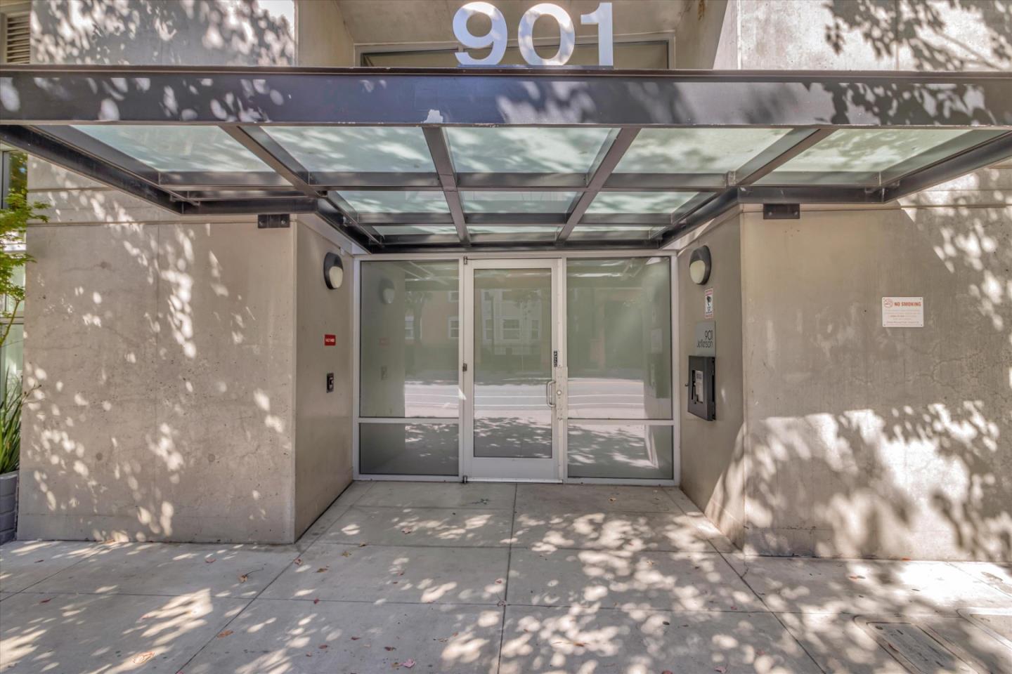 901 Jefferson Street, Unit 510 Oakland, CA 94607 - Photo 1 of 15 a view of a porch with a table and chairs