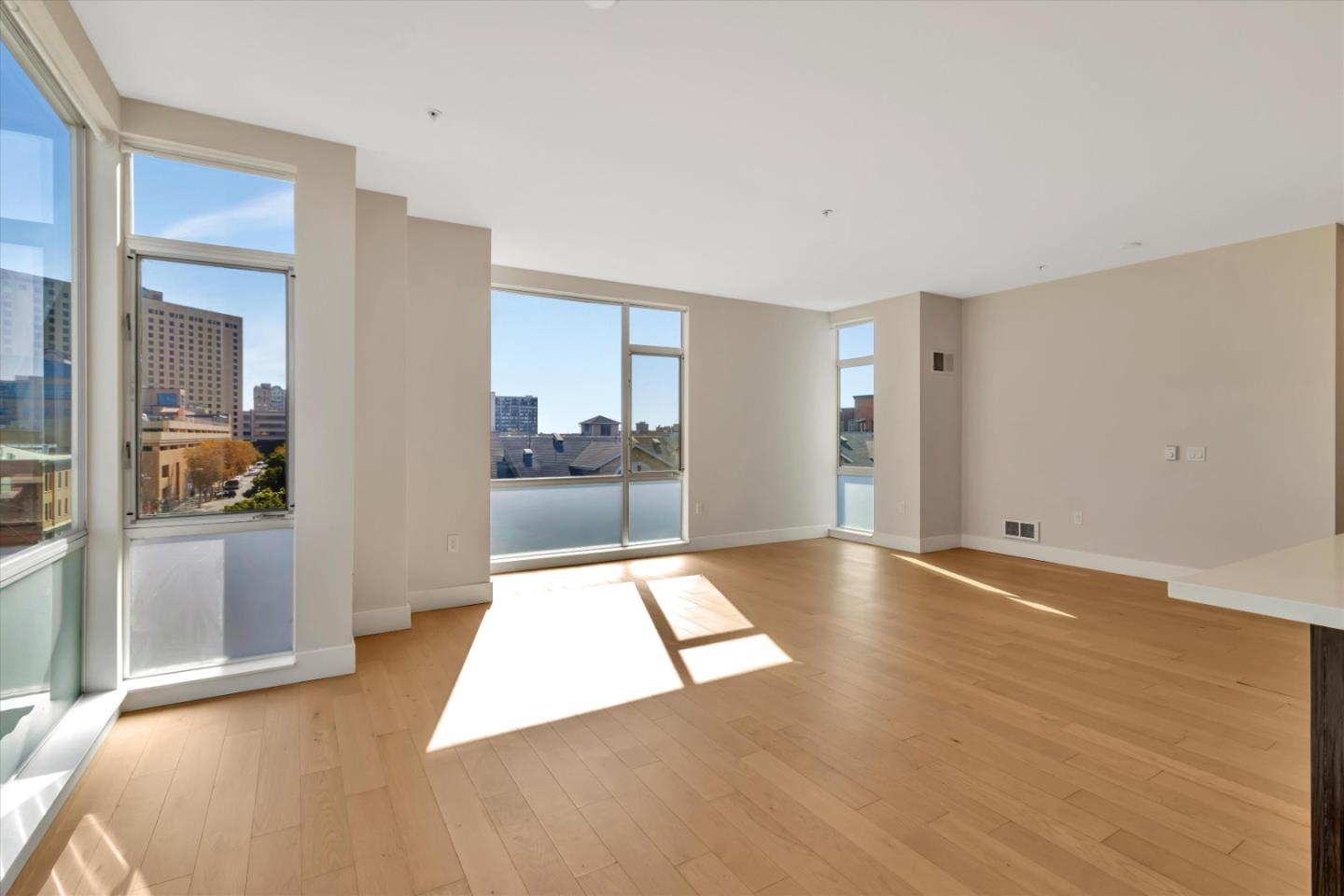 901 Jefferson Street, Unit 510 Oakland, CA 94607 - Photo 4 of 15 a view of empty room with kitchen view